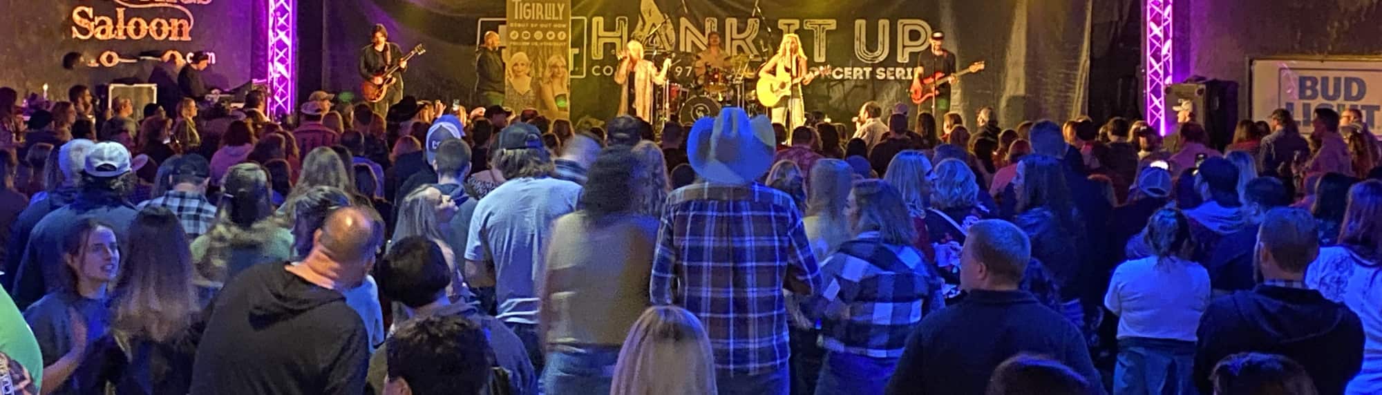 country concert with fans wearing cowboy hats Youngstown