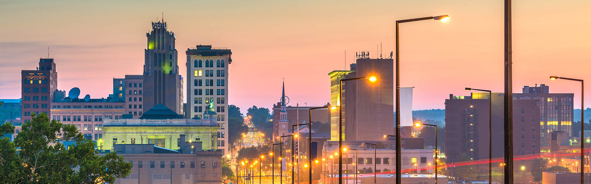 Neon color image of a band playing and people singing along